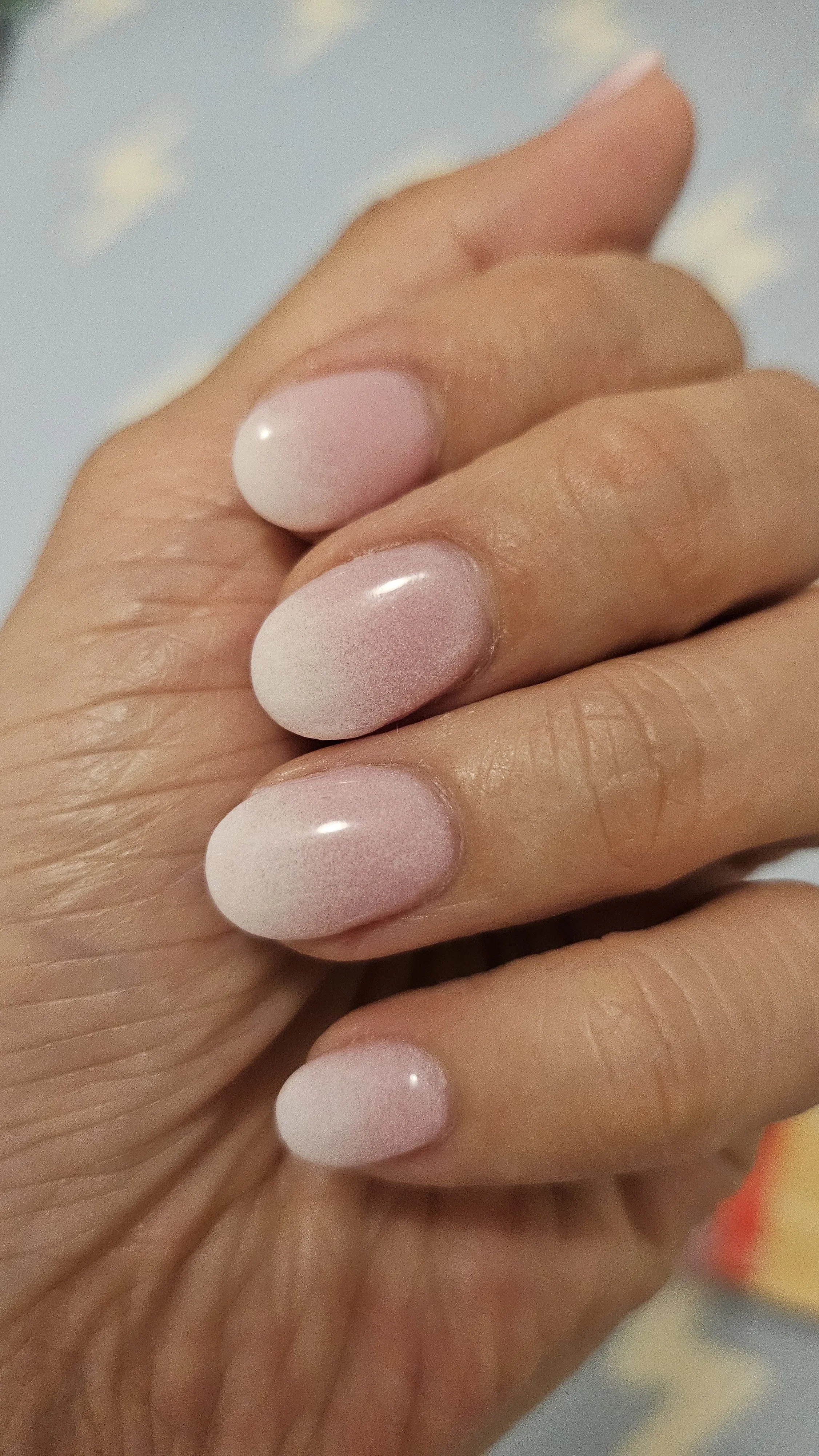 Soft pearl-nude round nails — a calm and elegant natural set